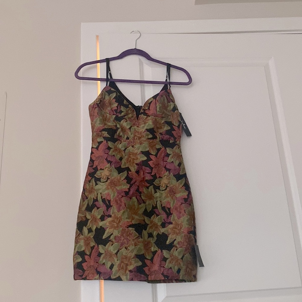 Never worn, with tags